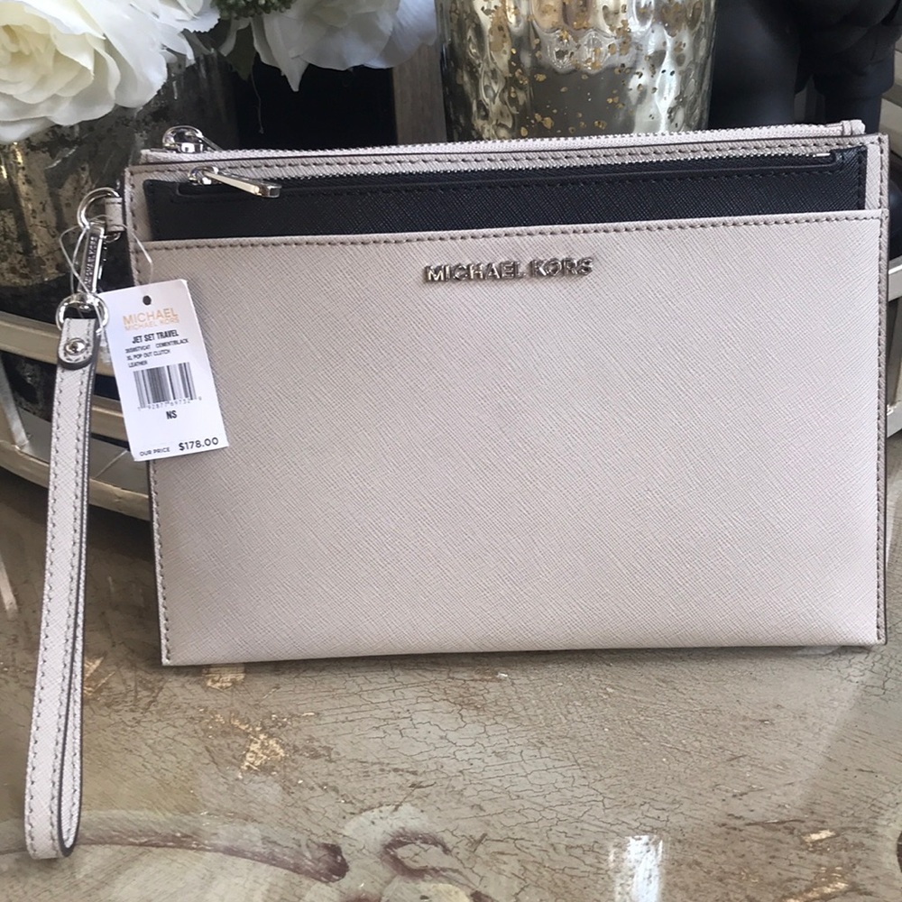 COPY - Michael Kors wristlet.